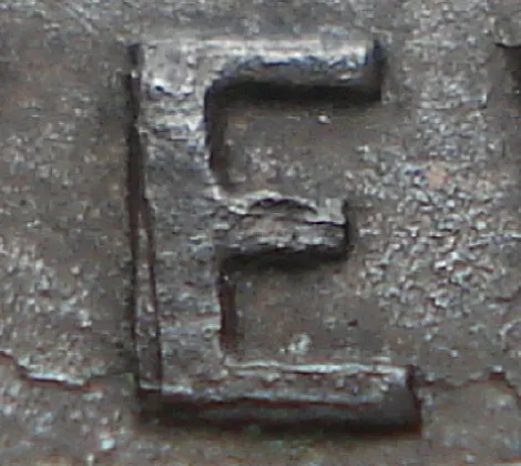 Re-engraved E in NEWF