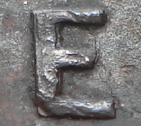 Re-engraved E in ONE