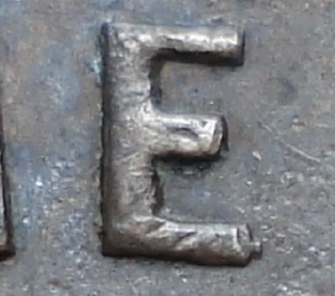 Re-engraved E in ONE