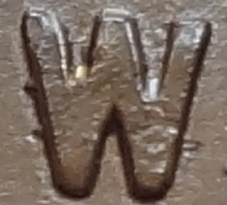 Re-engraved W in NEWF