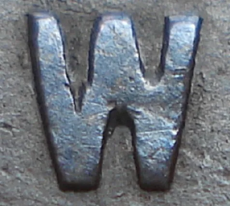 Re-engraved Romanesque W in NEWF