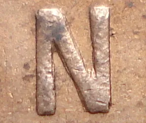 Re-engraved N in ONE
