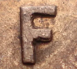Re-engraved F in NEWF