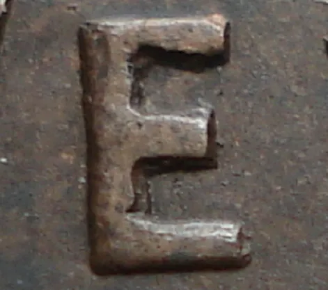 Re-engraved E in NEWF