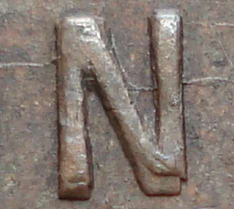 Re-engraved N in ONE