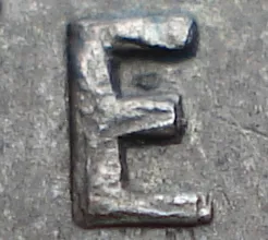 Re-engraved E in NEWF