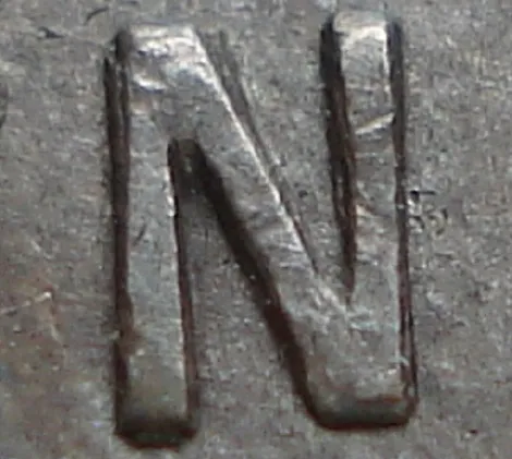 Re-engraved N in NEWF