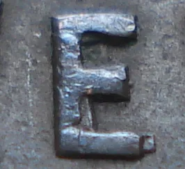 Re-engraved E in NEWF