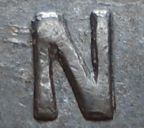 Re-engraved N in ONE