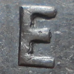 Re-engraved E in ONE
