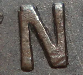 Re-engraved N in NEWF
