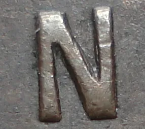 Re-engraved N in ONE