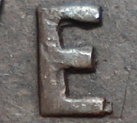 Re-engraved E inNEWF