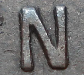Re-engraved N in NEWF