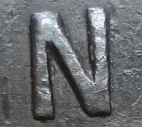 Re-engraved N in OUND