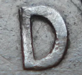 Re-engraved D in LAND