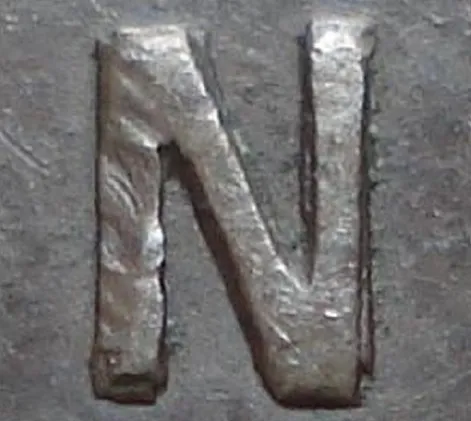 Re-engraved N in ONE