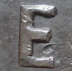 Re-engraved E in ONE