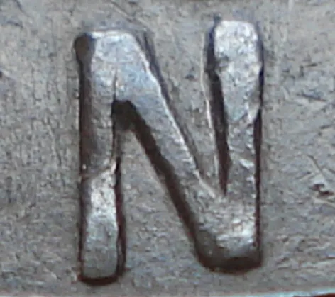 Re-engraved N in LAND