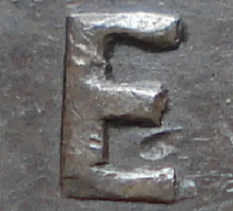 Re-engraved E in ONE