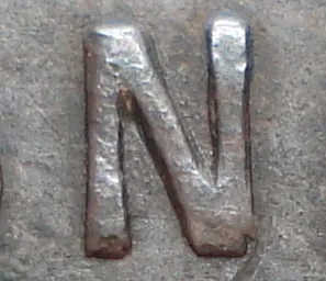 Re-engraved N in ONE