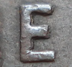 Re-engraved E in ONE