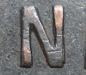 Re-engraved N in ONE