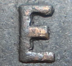 Re-engraved E in ONE
