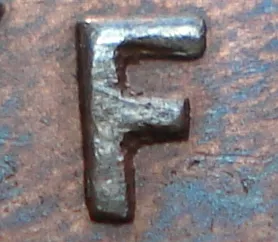 Re-engraved F in NEWF