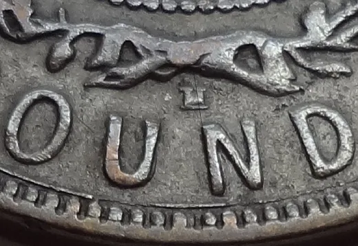 Re-engraved E in OUND