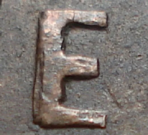 Re-engraved E in NEWF