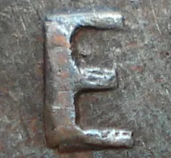 Re-engraved E in NEWF
