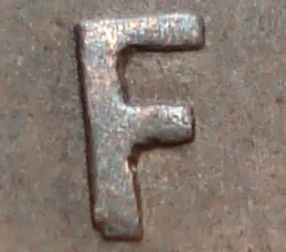 Re-engraved F in NEWF