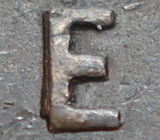 Re-engraved E in ONE