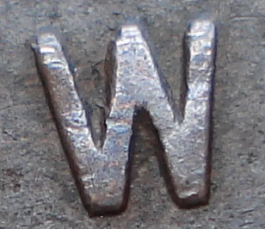 Re-engraved W in NEWF