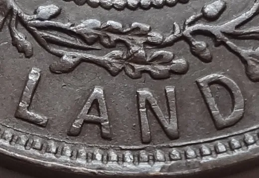 Re-engraved E in LAND
