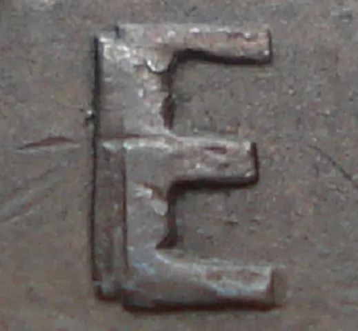 Re-engraved E in NEWF
