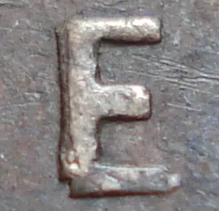Re-engraved E in ONE