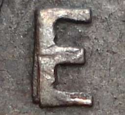Re-engraved E in NEWF