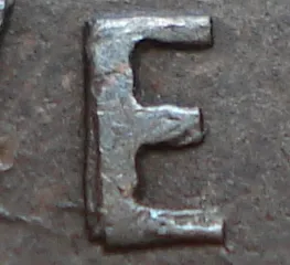 Re-engraved E in NEWF