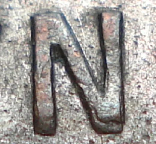 Re-engraved N in NEWF