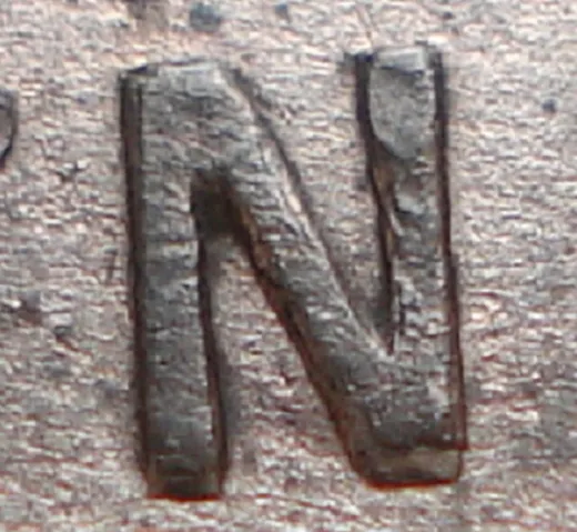 Re-engraved N in NEWF
