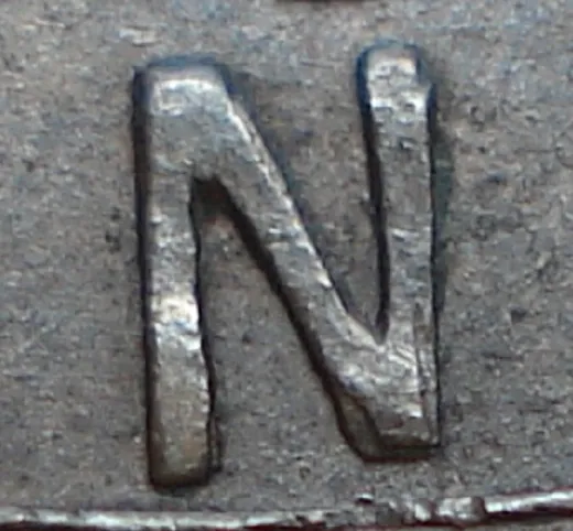 Re-engraved N in LAND