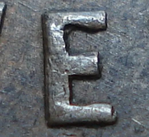 Re-engraved E in NEWF
