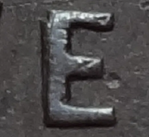 Re-engraved E in NEWF