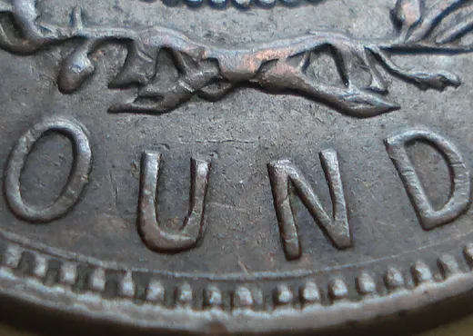 Re-engraved U in OUND