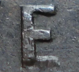 Repunched F over E in NEWF