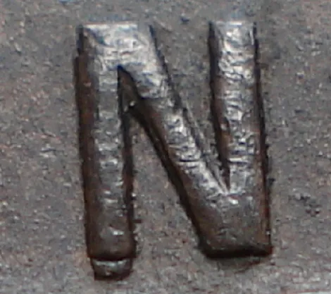 Re-engraved N in OUND