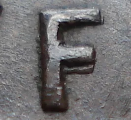 Re-engraved F in NEWF
