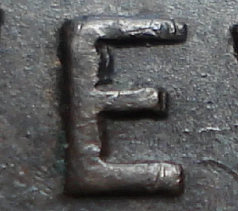 Re-engraved E in NEWF